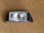 Arctic Wildcat Headlight Housing With Bracket As Pictured Stanley 001-3542. Fixed Price $25.00.