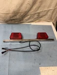71-72 Arctic Cat Taillight / Tube Assembly 0106-249. Fixed Price $34.99.