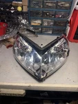 Polaris Oem 2015 Rmk Headlight Assembly 0542290. Fixed Price $38.00.