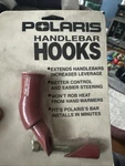 Polaris New Oem Snowmobile 45 Degree Handlebar Hooks Red (1 Per Pack). Fixed Price $52.00.