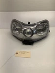 Headlight Assembly - 2007 Polaris Rmk Dragon 700. Fixed Price $100.00.