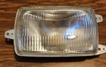 Obsolete Nos Oem Suzuki Snowmobile Headlight Lens Assembly 33100 97602 SM10-20J. Fixed Price $69.99.