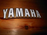 Nos Oem Yamaha TX500A Emblem Left Side Fuel Tank QTY.1 # 371-24161-01-00. Fixed Price $39.99.