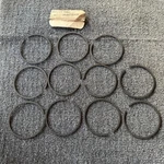 Piston Ring Set Of 11 Mercury Quicksilver Oem Nos 39-64715A12. Fixed Price $22.00.